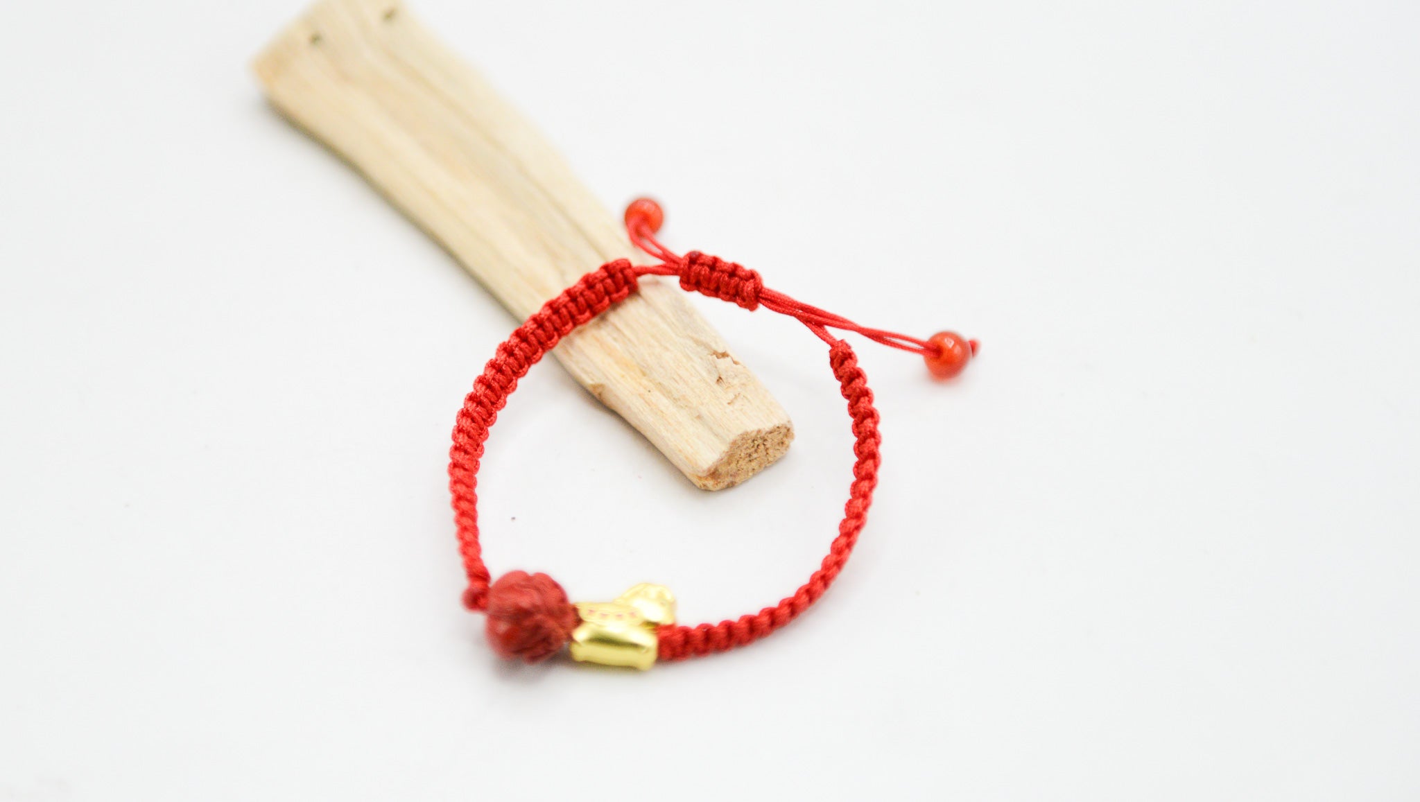 Red Cord with Carved Cinnabar & Horse Charm Adjustable Bracelet
